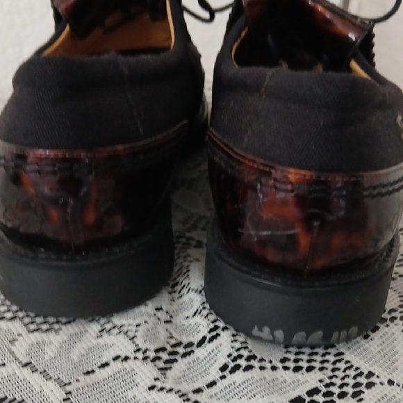 Stuart Weitzman Black and Brown Slip-On Loafers with Moccasin Golf Shoe